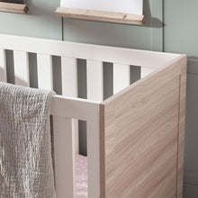 Load image into Gallery viewer, Silver Cross Finchley Oak Cot Bed Headboard Detail in Lifestyle Image
